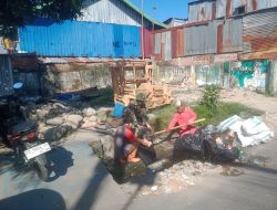 Karya Bakti Pembersihan Selokan Koramil 1408-04 Btl