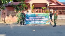 TNI dan Warga Gelar Karya Bakti Bersihkan Selokan di Kelurahan Baraya